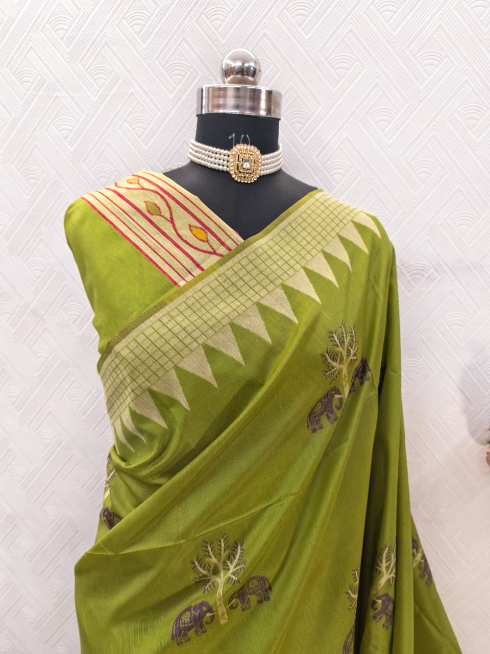 Handloom Light Green Colored Soft Raw Silk Ikkat Weaving Saree with Temple Border & Running Blouse