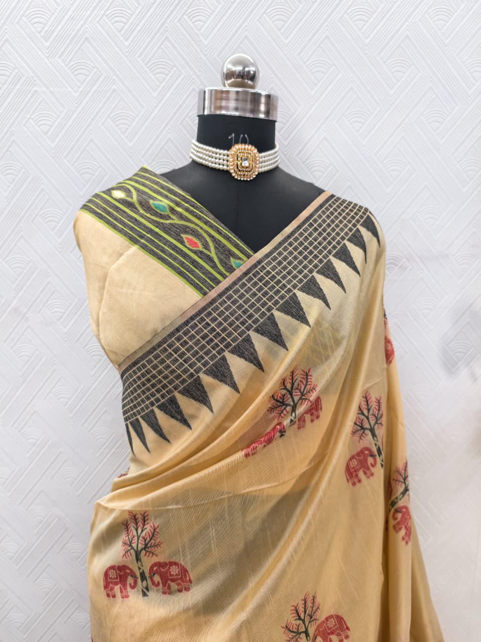 Handloom Beige Colored Soft Raw Silk Ikkat Weaving Saree with Temple Border & Running Blouse