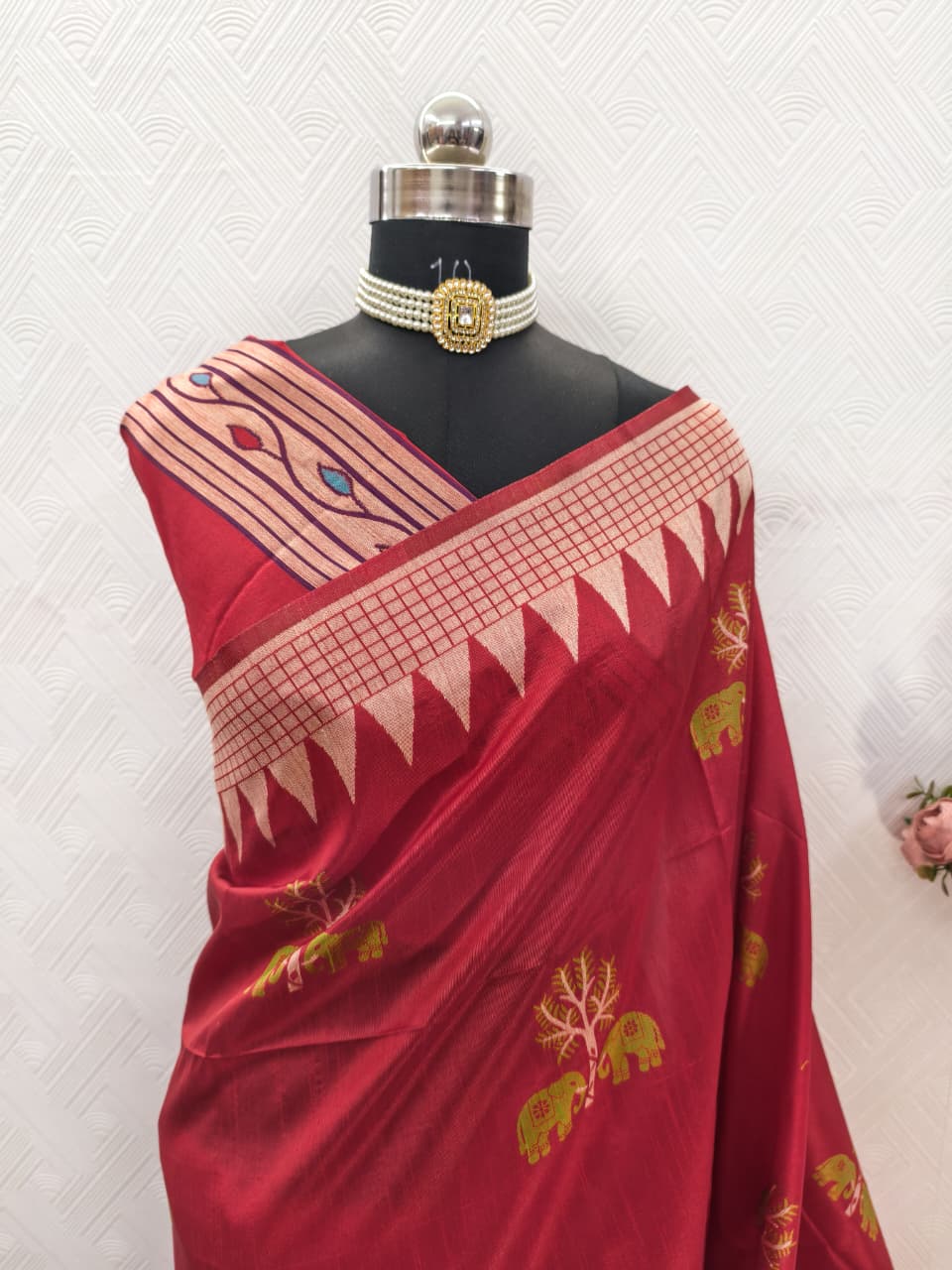 Handloom Rani Pink Colored Soft Raw Silk Ikkat Weaving Saree with Temple Border & Running Blouse