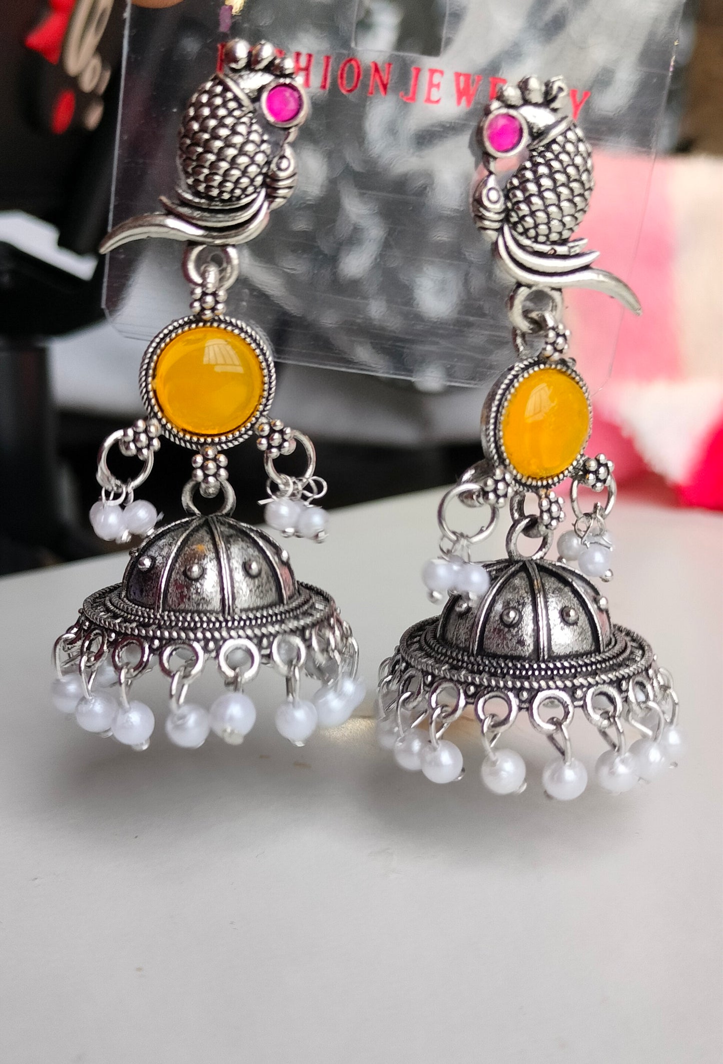 Oxidized Silver Peacock Jhumka Earrings with Yellow Stone & Pearl Drops – Traditional Ethnic Jewelry for Women