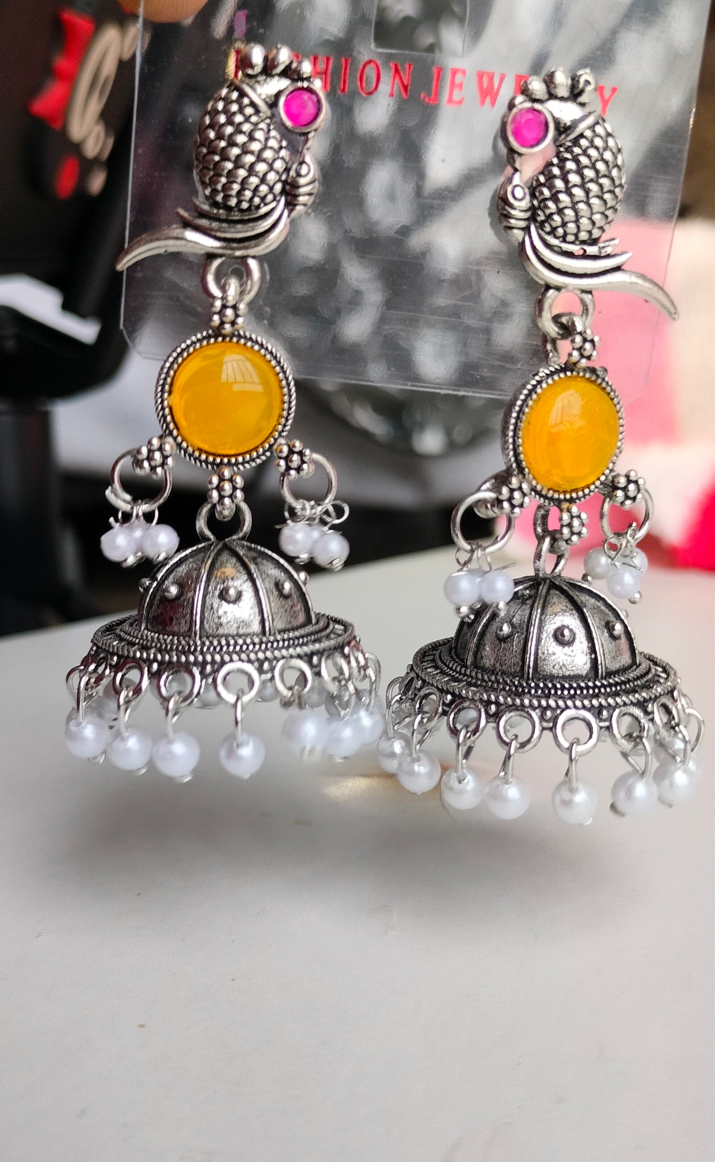 Oxidized Silver Peacock Jhumka Earrings with Yellow Stone & Pearl Drops – Traditional Ethnic Jewelry for Women