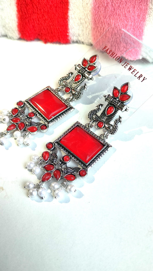 Oxidized Silver Peacock Dangler Earrings with Red Stone & Pearl Drops – Ethnic Party Wear Jewelry for Women