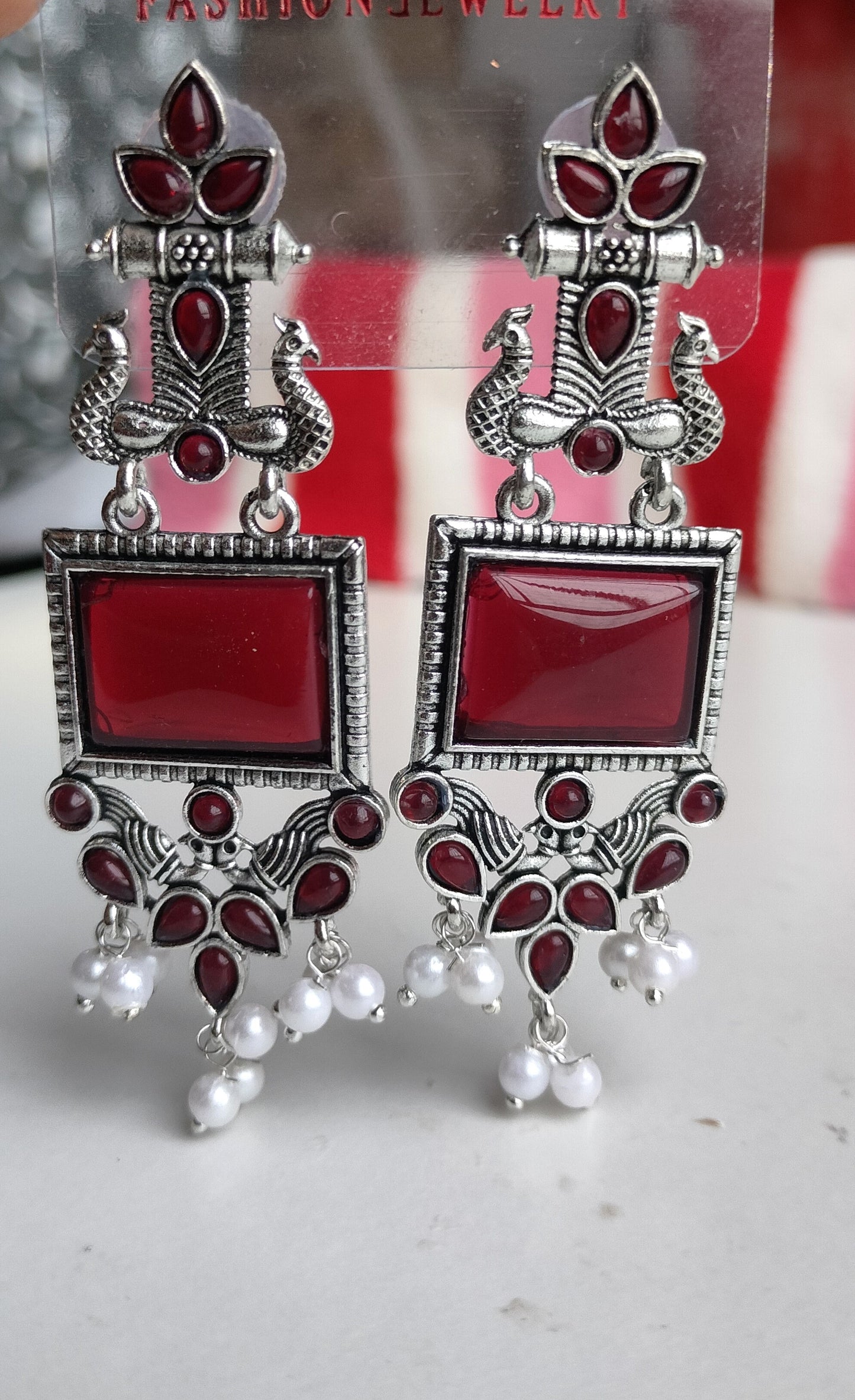 Oxidized Silver Peacock Dangler Earrings with Maroon Stone & Pearl Drops – Ethnic Party Wear Jewelry for Women