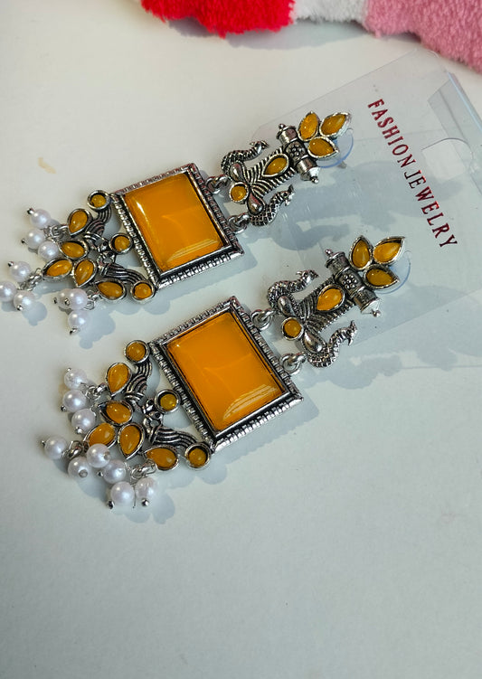 Oxidized Silver Peacock Dangler Earrings with Yellow Stone & Pearl Drops – Ethnic Party Wear Jewelry for Women