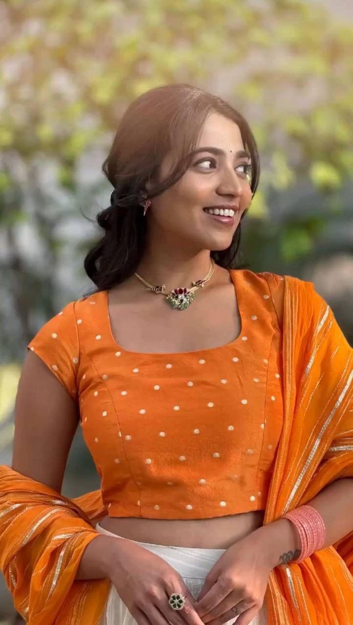 Latest Orange and White Colored Jacquard Silk Festive Lehenga Choli