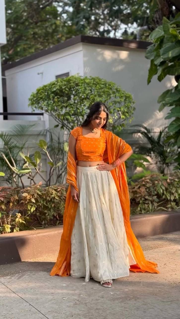 Latest Orange and White Colored Jacquard Silk Festive Lehenga Choli