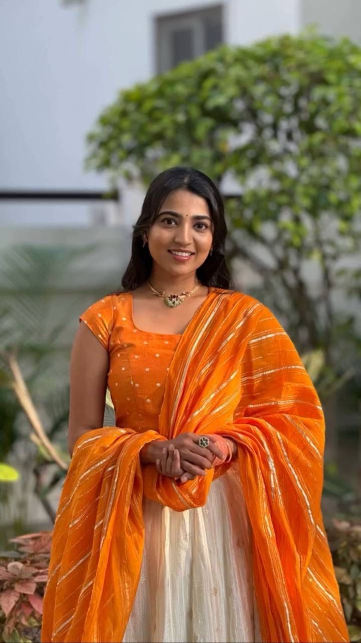 Latest Orange and White Colored Jacquard Silk Festive Lehenga Choli