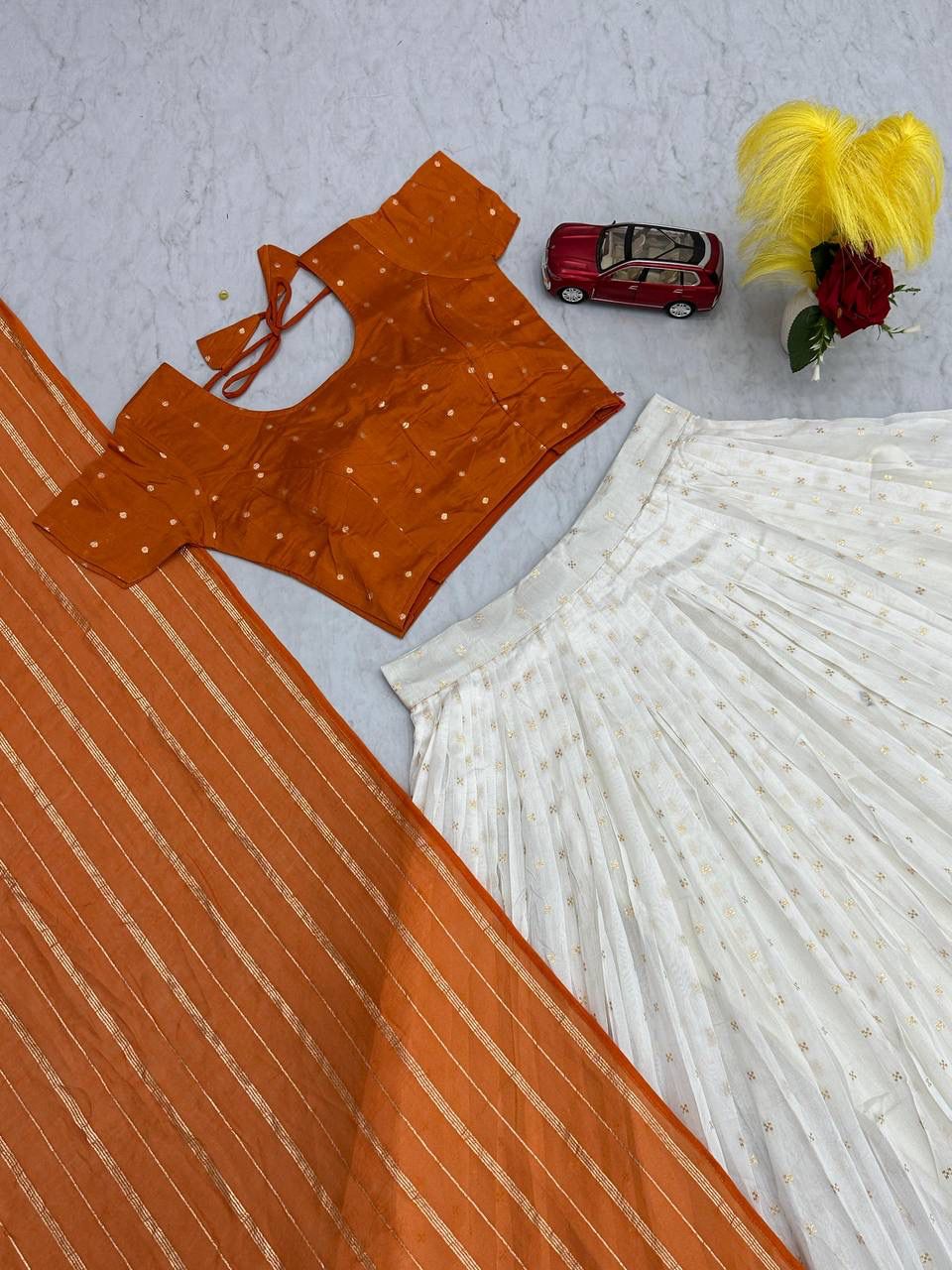 Latest Orange and White Colored Jacquard Silk Festive Lehenga Choli