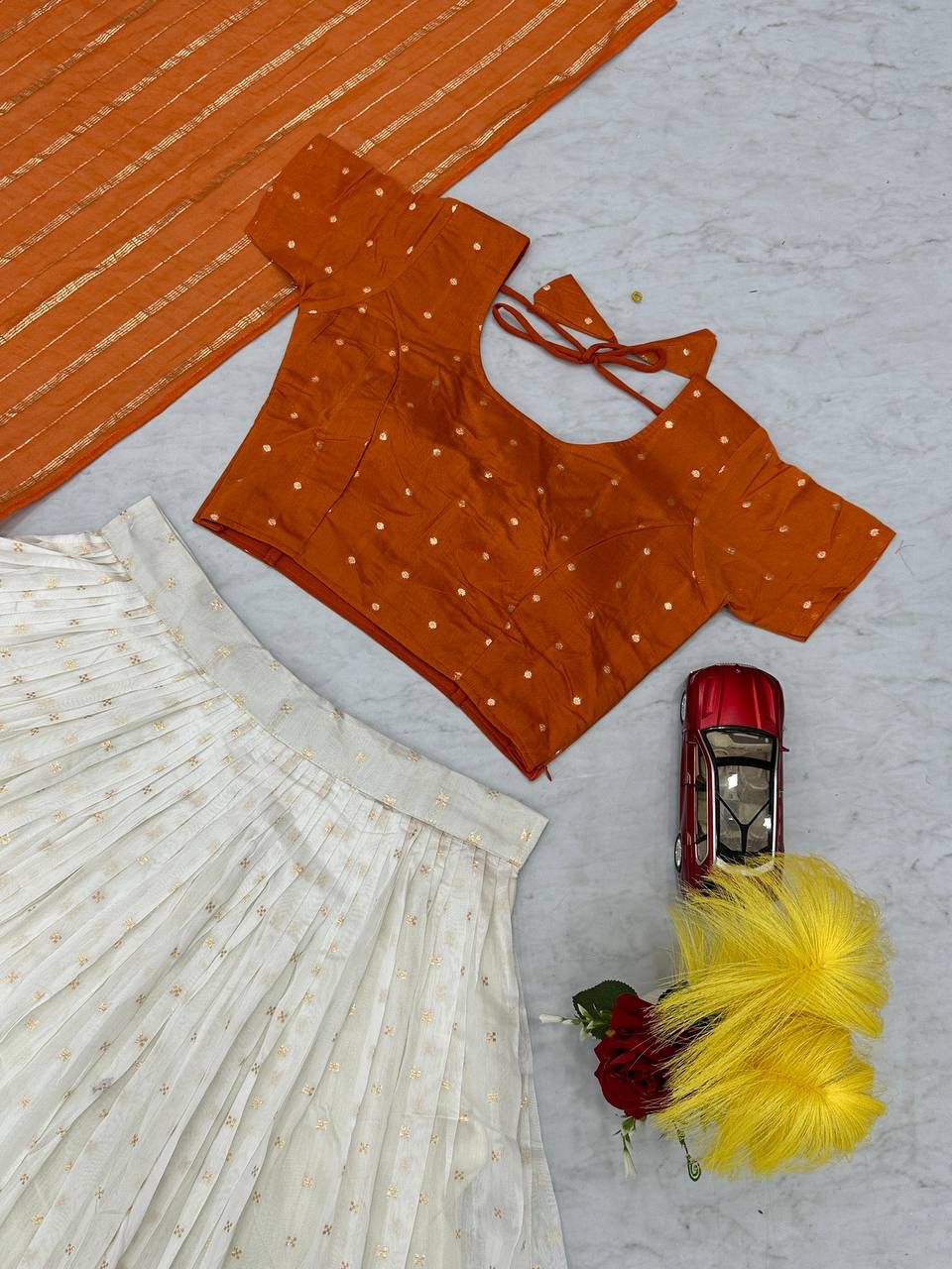 Latest Orange and White Colored Jacquard Silk Festive Lehenga Choli