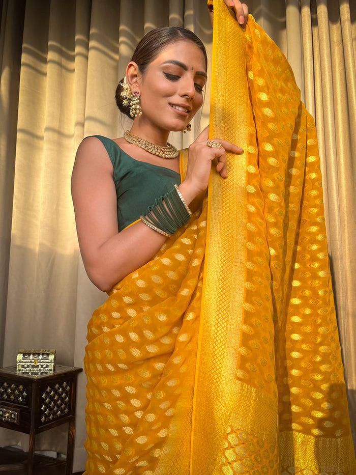 Embracing Yellow Colored Soft Lichi Silk Saree with Heavy Jacquard Work & Rich Border