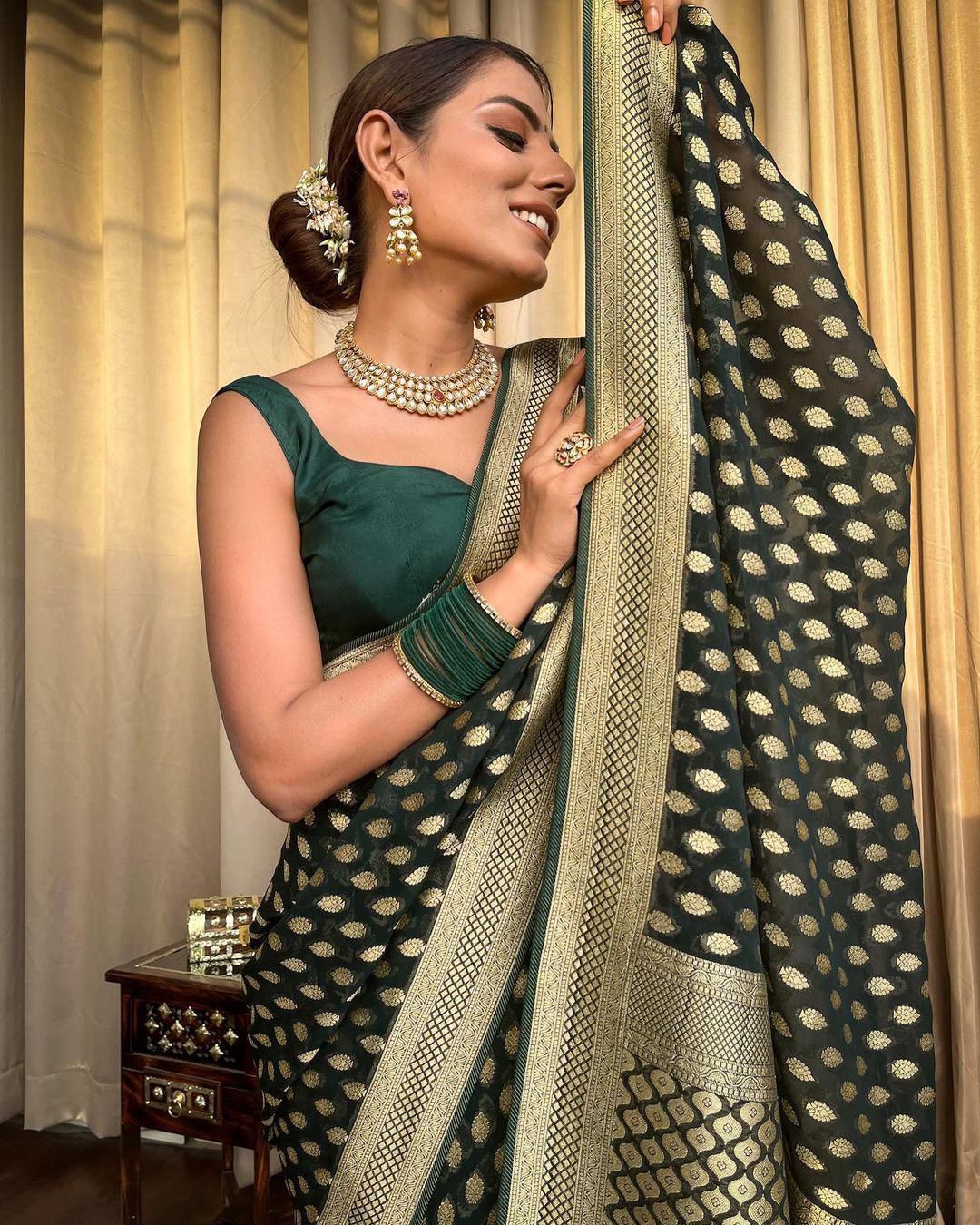 Embracing Dark Green Colored Soft Lichi Silk Saree with Heavy Jacquard Work & Rich Border