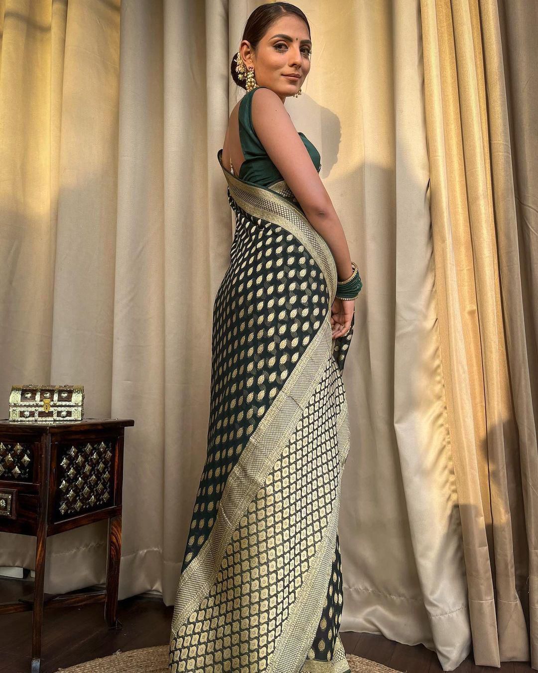 Embracing Dark Green Colored Soft Lichi Silk Saree with Heavy Jacquard Work & Rich Border