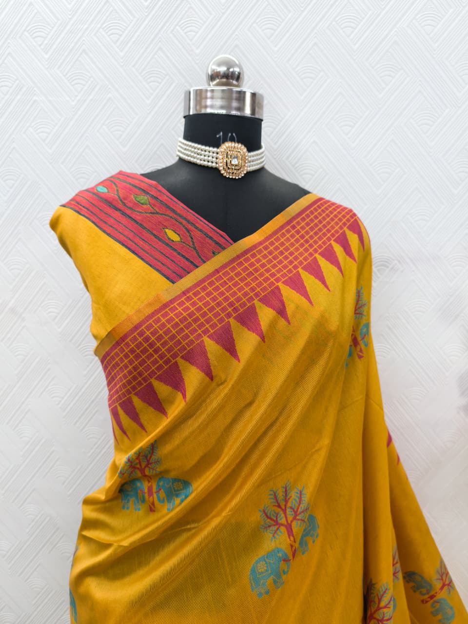 Handloom Yellow Colored Soft Raw Silk Ikkat Weaving Saree with Temple Border & Running Blouse