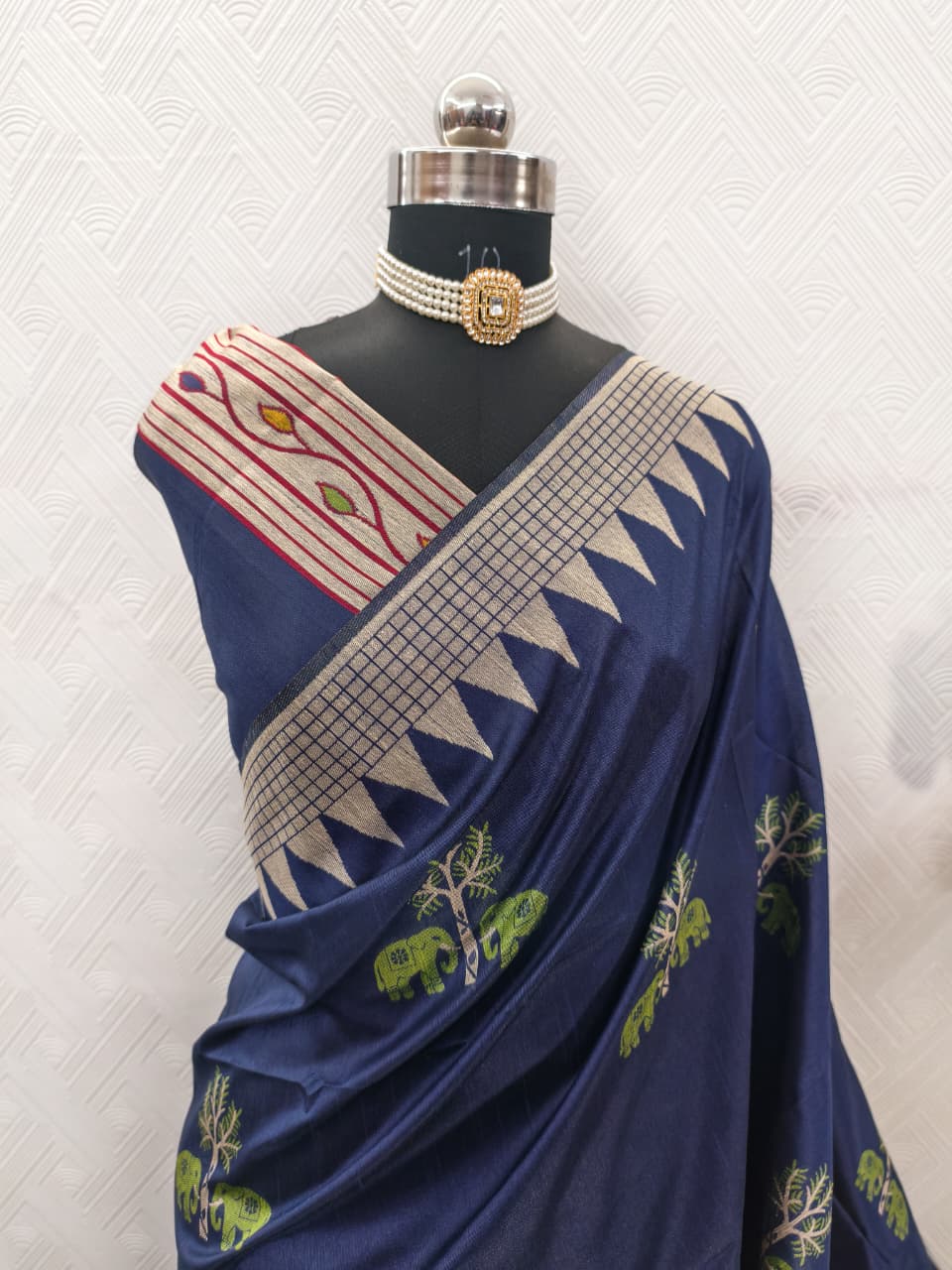 Handloom Navy Blue Colored Soft Raw Silk Ikkat Weaving Saree with Temple Border & Running Blouse