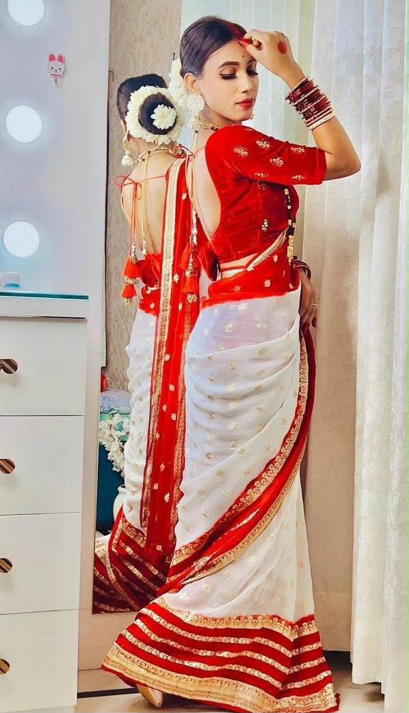 Engaging Red & White Colored Viscose Georgette Saree with Elegant Pallu & Contrast Running Blouse